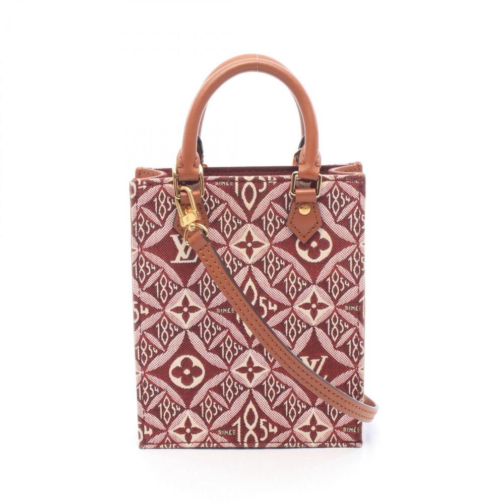 LOUIS VUITTON Brown Monogram Leather Bag